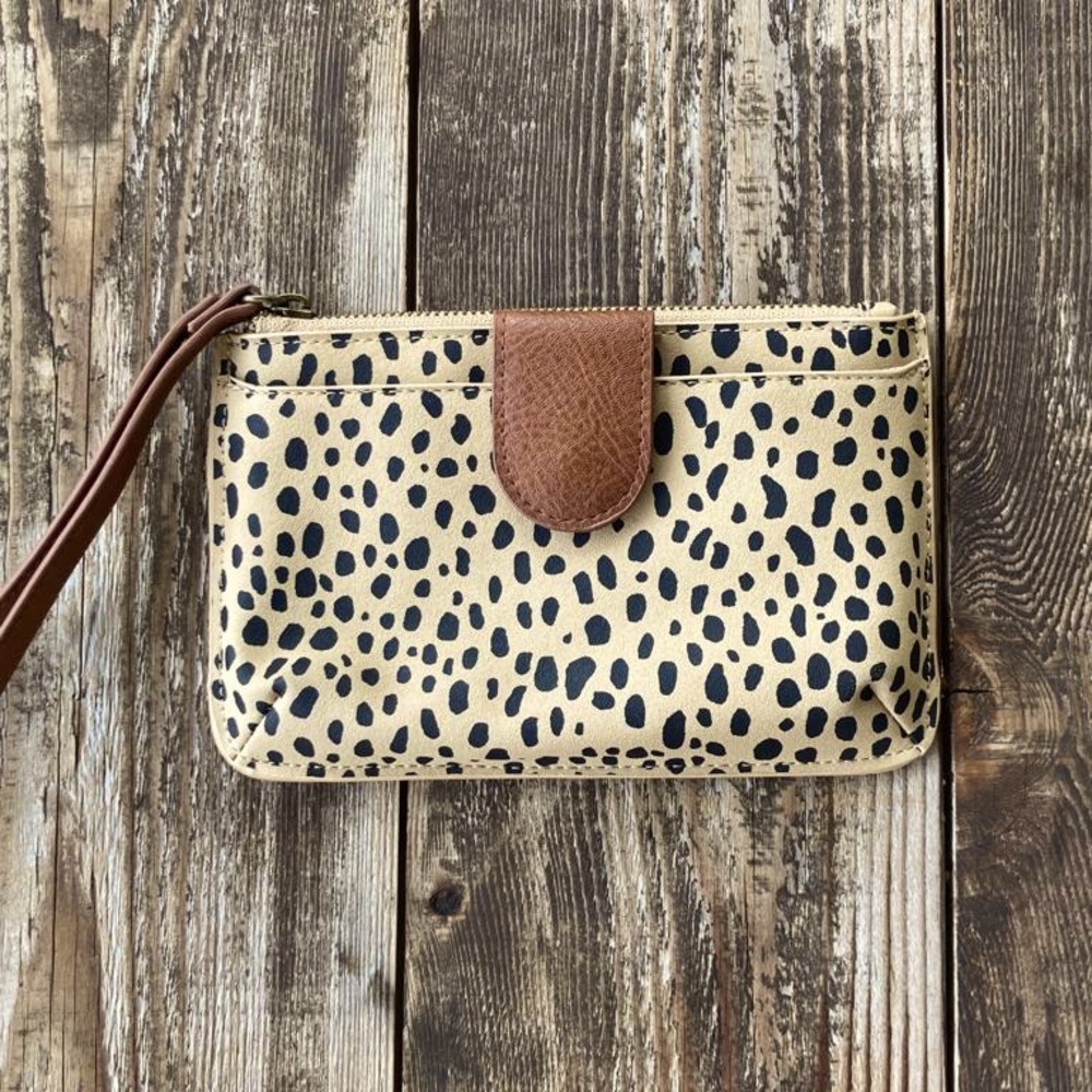 Small leopard print in beige colored coin pouch/ hand bag.